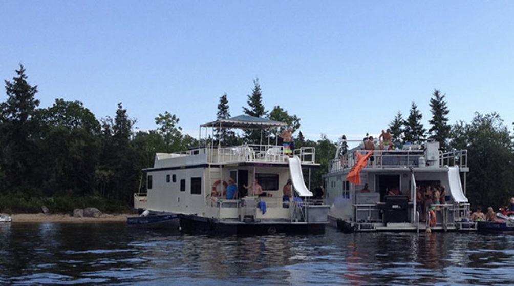 Two houseboats with parties