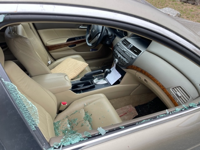 Car broken into with smashed windowq