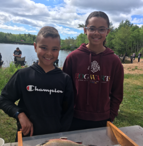 picture of two children at fishing event