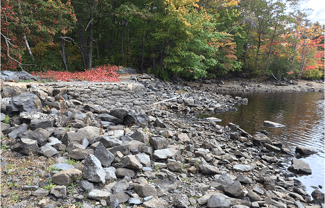 Leaky Williams Lake dam at low summer levels. October, 2021