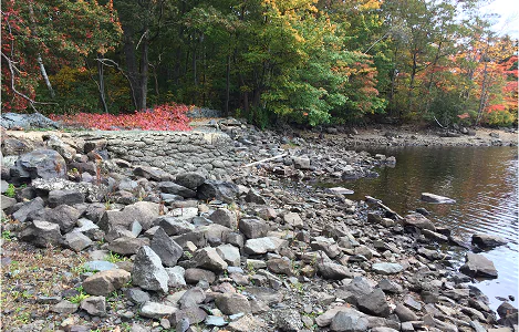 Leaky Williams Lake dam at low summer levels. October, 2021
